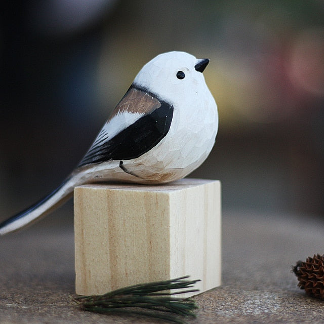 Handcrafted wooden bird art, charming Scandinavian style figurines for garden or home decor.