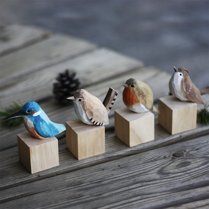 Decorative wooden bird figurines, intricate carved wood wildlife art. A unique nature lover gift.