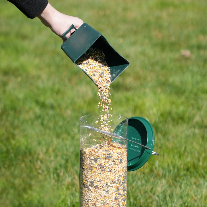 Durable squirrel-proof bird feeder for wild birds, perfect garden decor for backyard bird watching. Plastic.