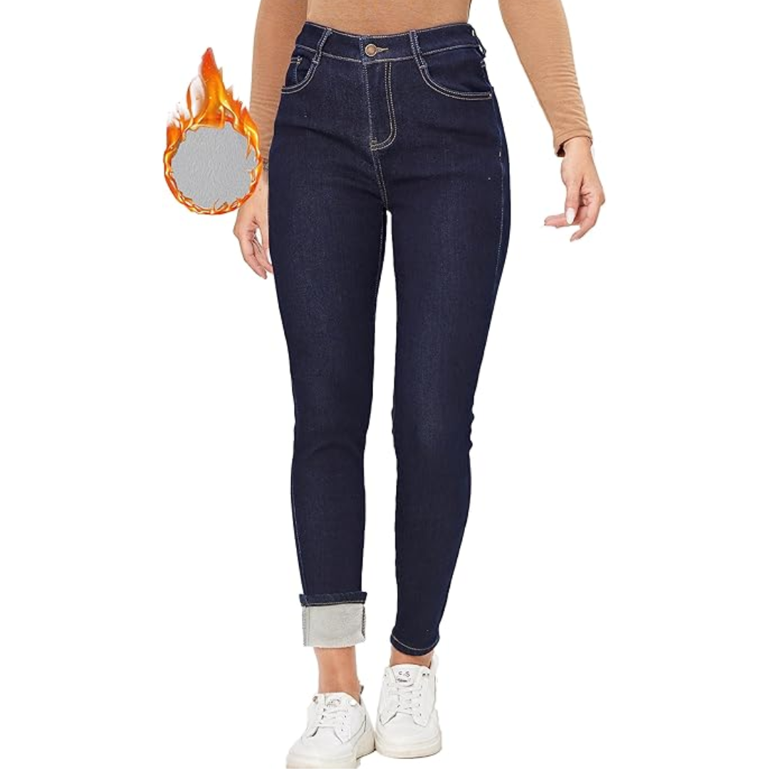 Model wearing women's fleece-lined skinny jeans, paired with winter top