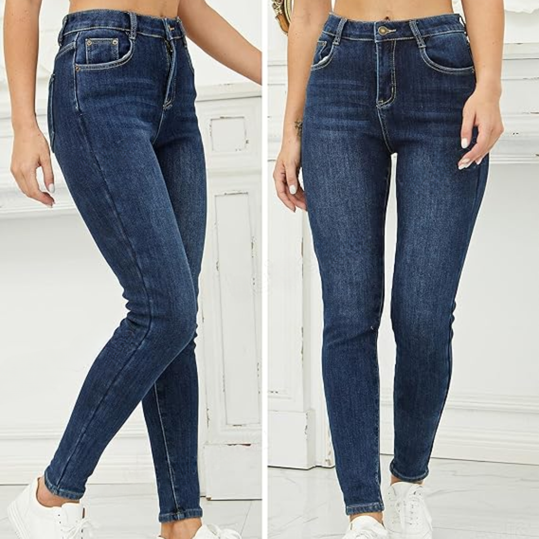 Stack of folded women's fleece-lined thermal skinny jeans in various washes