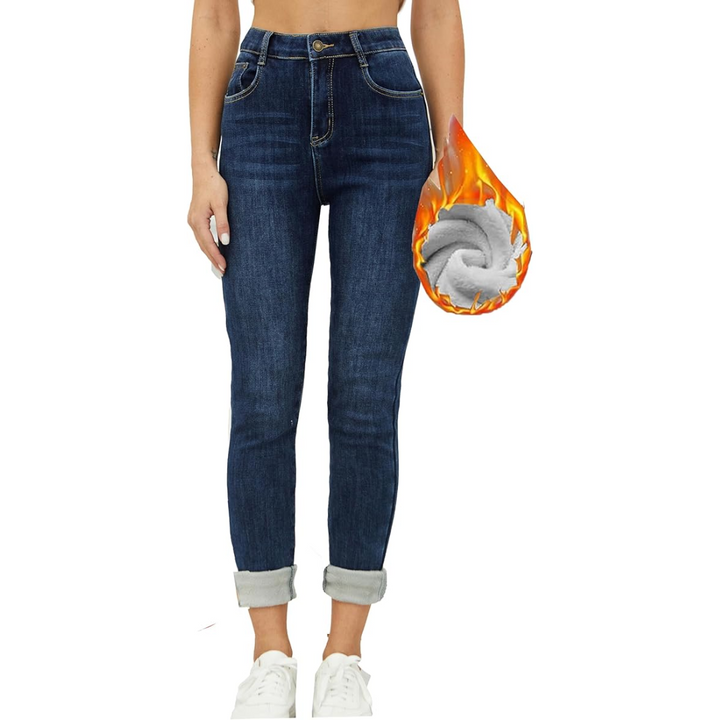 Warm winter fashion: women's stretch skinny thermal jeans, light wash