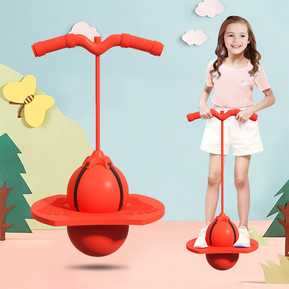 Happy child balancing on a red jump ball toy, enhancing coordination during active indoor play.