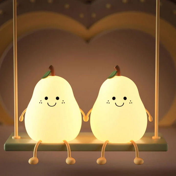 Cute pear night light, an adorable nursery decor piece and comforting LED kids lamp to aid children's sleep.