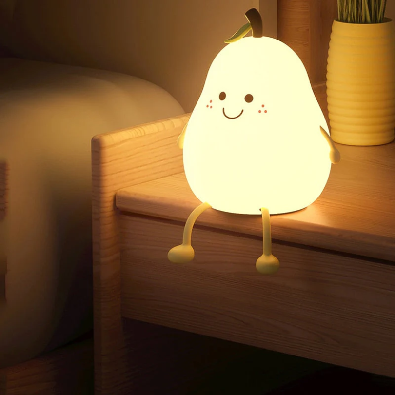 Children's comfort pear night light, a gentle LED kids lamp creating a soft glow for bedtime and sleep.
