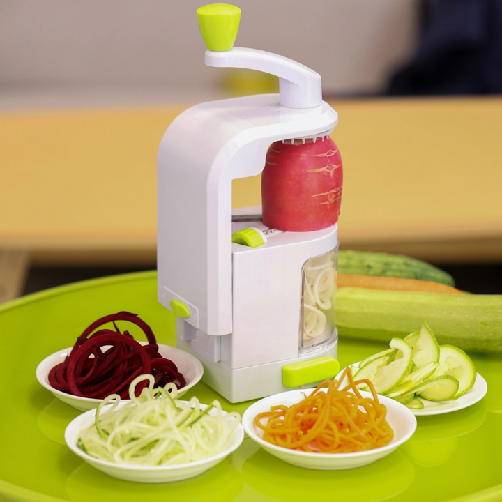 Heavy-duty 4-in-1 vegetable spiralizer on a kitchen counter, perfect for making healthy veggie noodles.