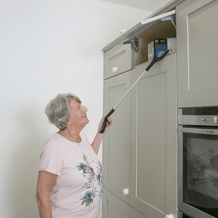 Reach extender grabber for seniors & disabled. Securely pick up objects without bending or straining.