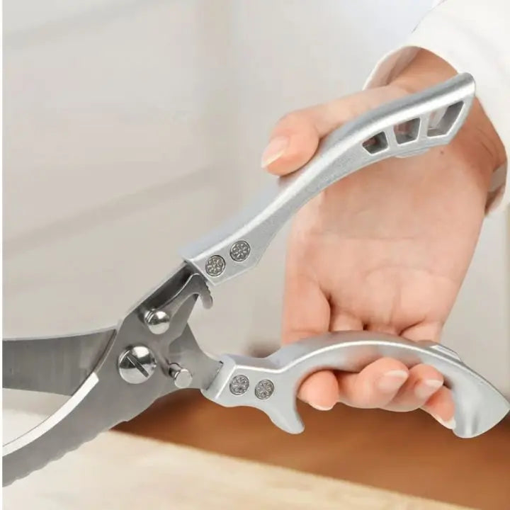 Multifunction kitchen utility shears: poultry scissors, fish scaler, and food prep tool.
