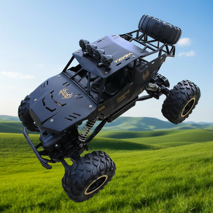 Close-up of a rugged 4x4 RC monster truck's tires and suspension, built for tough offroad terrain.