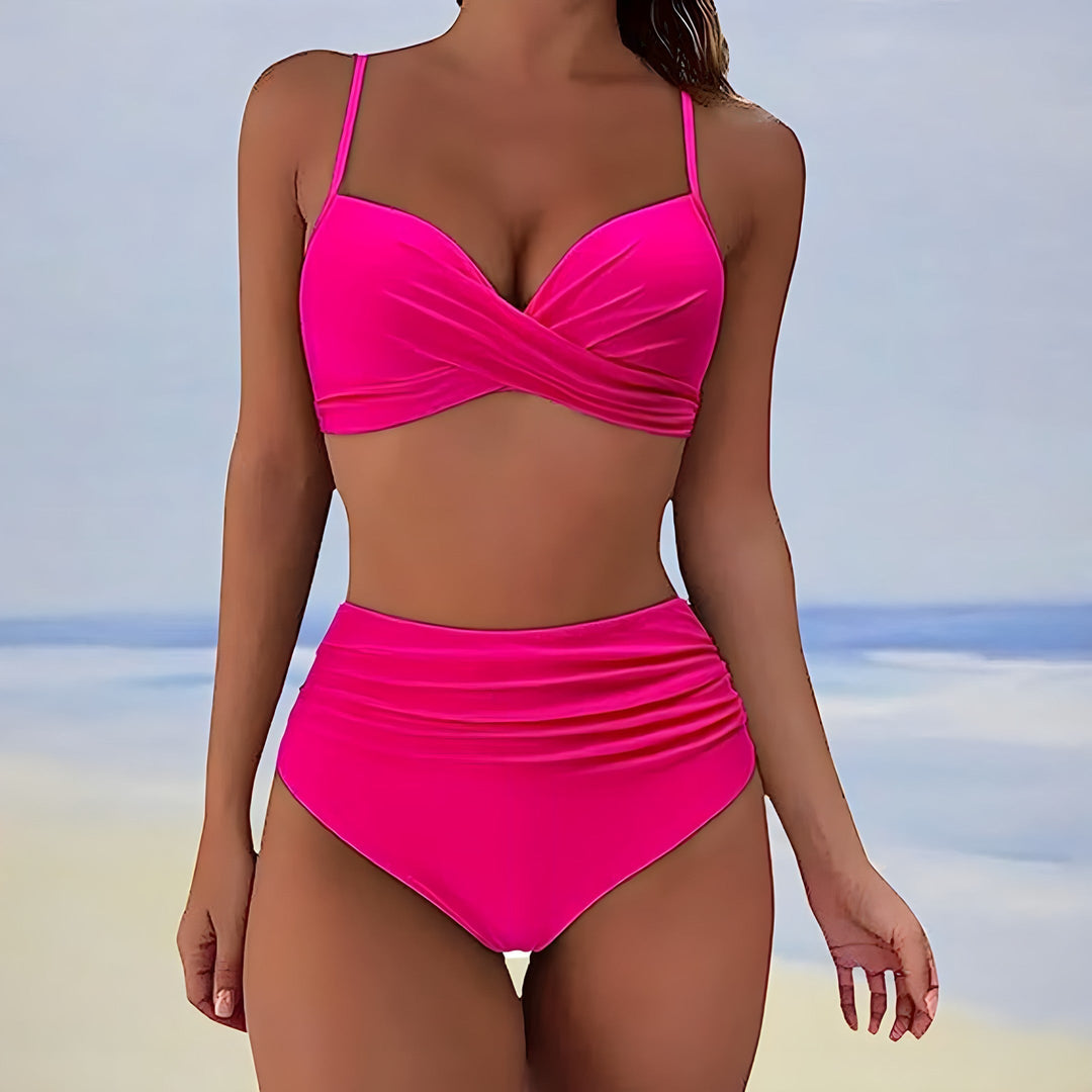Detail of the high-waist cut on womens bikini bottoms, flattering and supportive fit