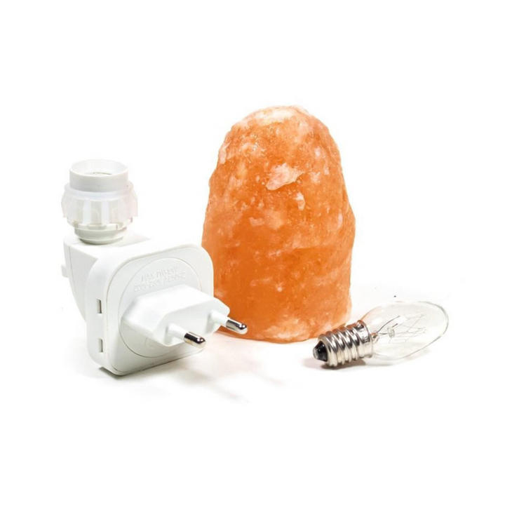 Warm, amber-glowing Himalayan salt lamp creates a calming atmosphere for meditation & therapeutic mood lighting.