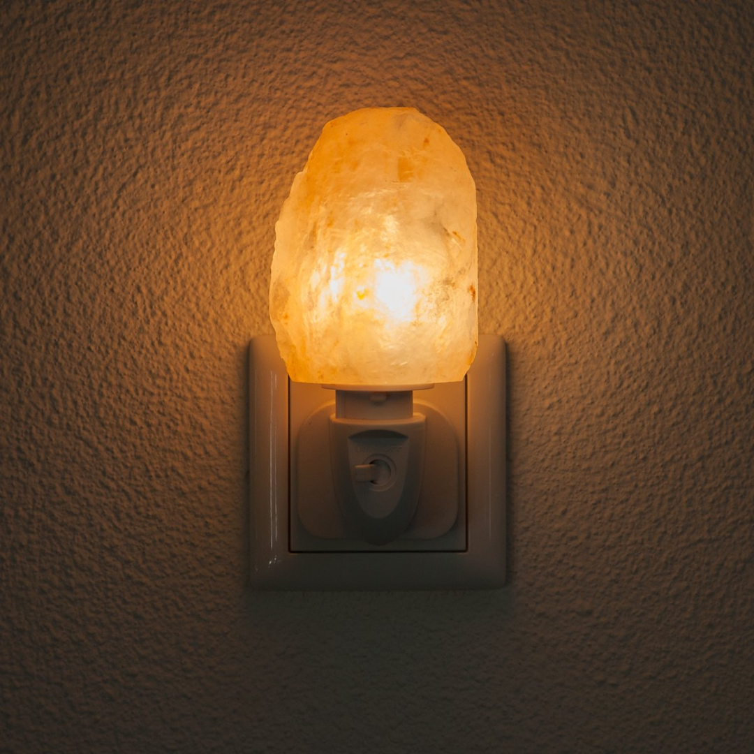 Natural Himalayan salt lamp, a decorative air purifier and source of soft, natural light for any room.