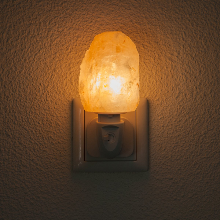 Natural Himalayan salt lamp, a decorative air purifier and source of soft, natural light for any room.