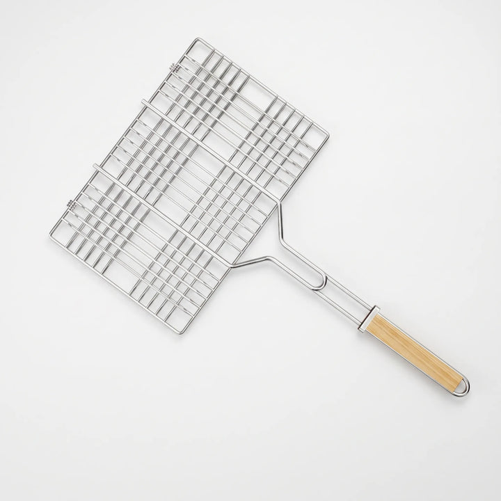 Hinged outdoor grilling basket designed for easy, safe flipping of food, ideal for all your BBQ adventures.
