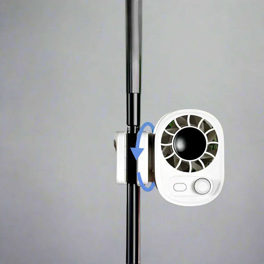 Hipacool ClipAir personal cooler, a black portable car fan, clipped to an auto seat headrest.