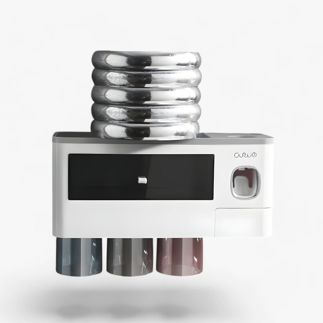 Close-up of HygiaHolder wall-mounted toothbrush holder, showing dispenser mechanism.