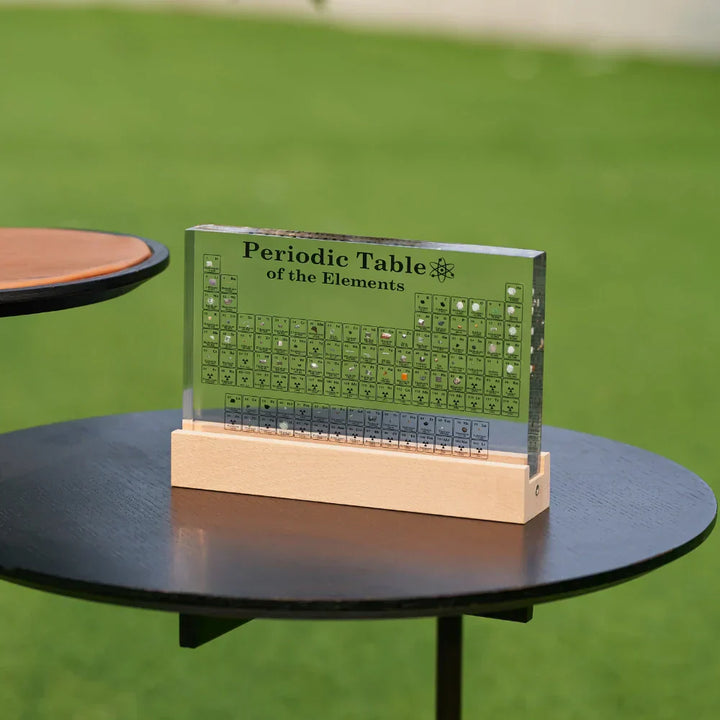 Close-up of Elementa Illuminated Periodic Table, showcasing real embedded elements and acrylic design