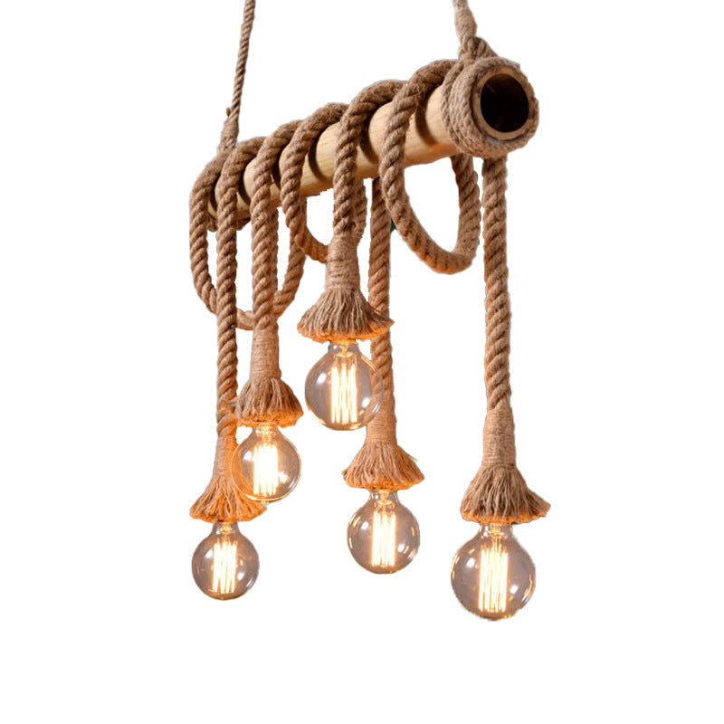 Statement industrial bamboo pendant, adjustable fixture for dining room elegance.