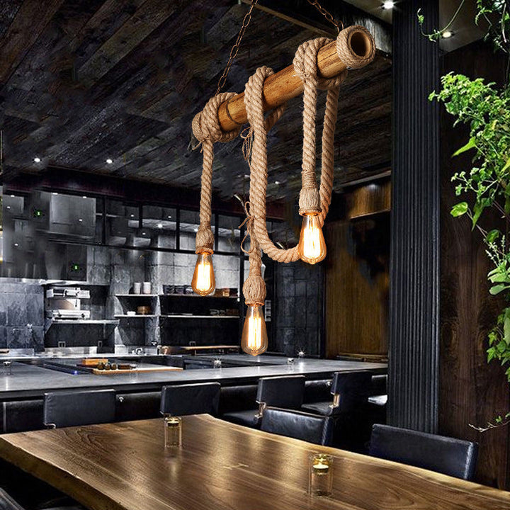 Versatile industrial bamboo pendant, adjustable light perfect for kitchen islands.