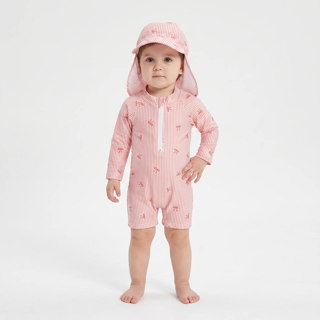 Toddler striped long-sleeve rash guard swim set & sun protection hat for active water play.