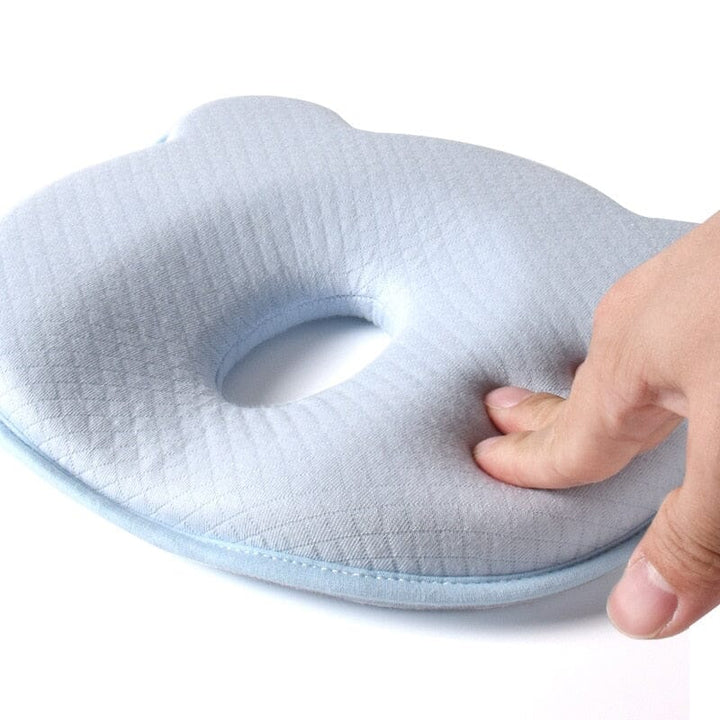 Newborn head support pillow with memory foam, designed for flat head prevention & maximum comfort.
