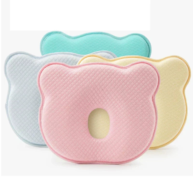 Comfortable infant head support pillow, memory foam construction for flat head syndrome prevention.