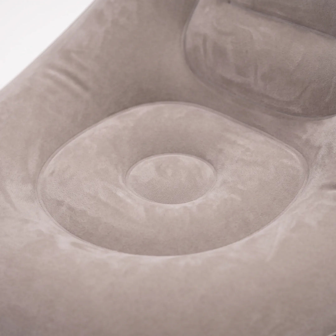 Comfortable inflatable lounge chair with matching ottoman for ultimate relaxation, indoor or outdoor.