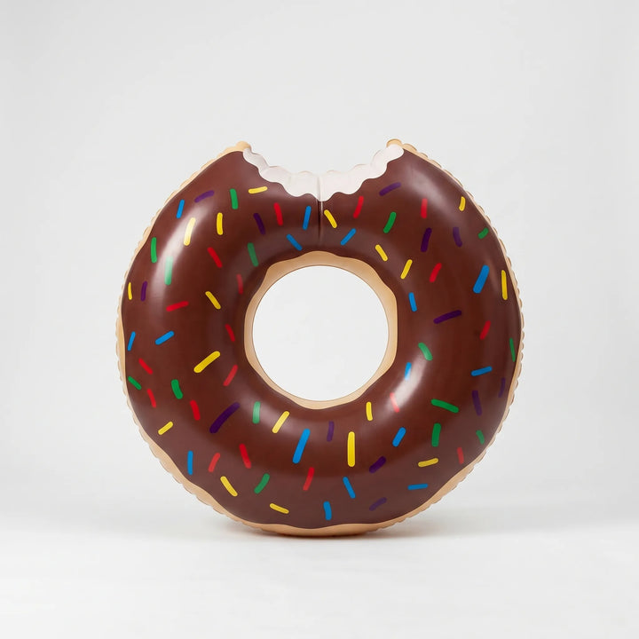 Fun novelty donut pool ring, ideal for outdoor water recreation.
