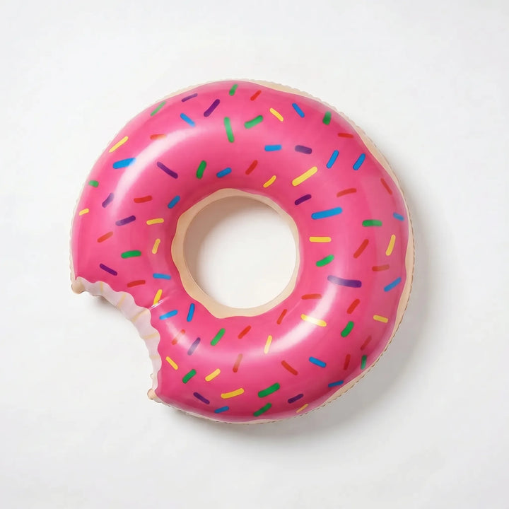 Vibrant pink donut pool float, bringing sweet summer fun to any pool or beach.