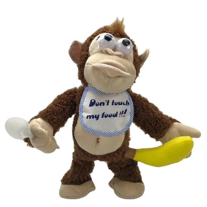 Naughty electronic plush monkey with banana, an interactive animal toy & funny gift for kids.