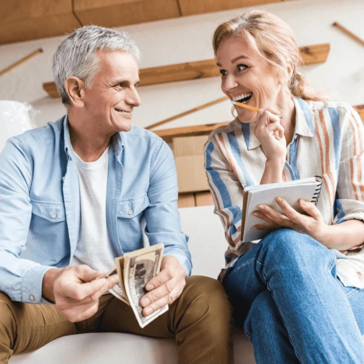 Couple enjoying conversation with invisible in-ear hearing aids, discreet SoundComfort audio