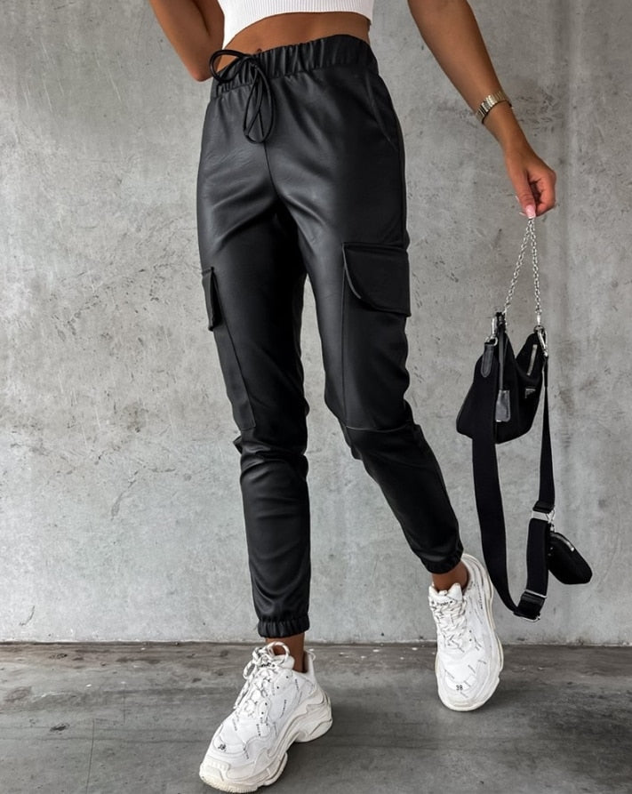 Trendy jade faux leather cargo pants, comfortable and edgy. Perfect women's fashion for casual wear or night out.