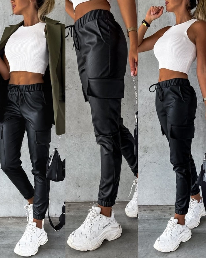 Edgy jade faux leather cargo trousers for women, combining comfort with trendy fashion. Versatile pants for any occasion.