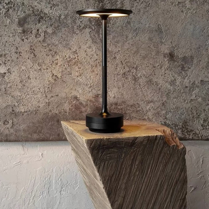 Portable Japanese LED touch lamp, a versatile home accent. Cordless ambient light for any room.