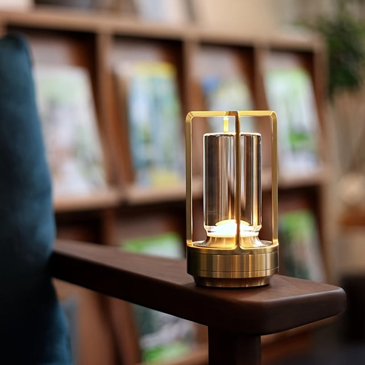 Sleek metal Japanese LED touch lamp. Rechargeable cordless table light for modern, serene ambiance.