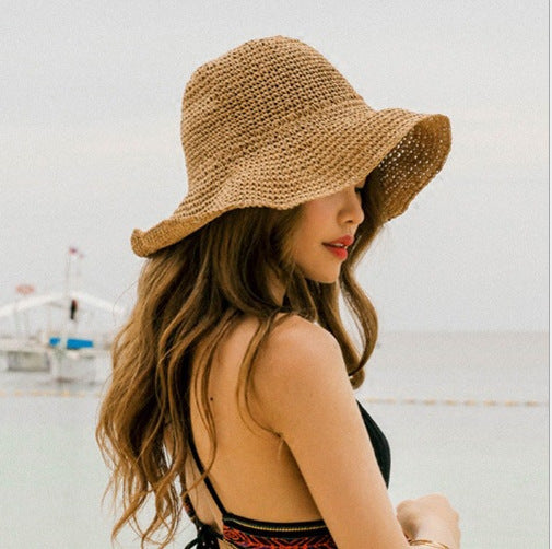 Khaki lightweight summer beach hat for women offering sun protection, perfect for travel