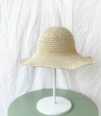 Fashionable beige summer hat for women, lightweight and essential for sun protection