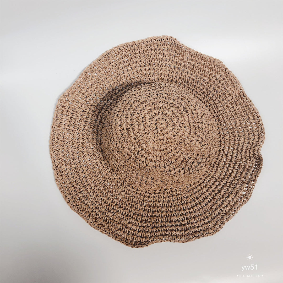 Fashionable women's summer hat in beige, designed for sun protection and light wear