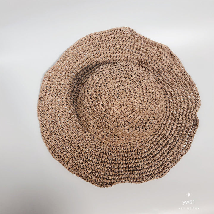 Fashionable women's summer hat in beige, designed for sun protection and light wear