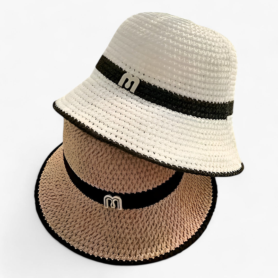 Khaki wide brim women's sun hat, foldable for travel, offering sun protection for beach or summer.