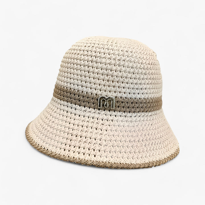 Black foldable wide brim sun hat for women, ideal for beach, travel, and summer sun protection.