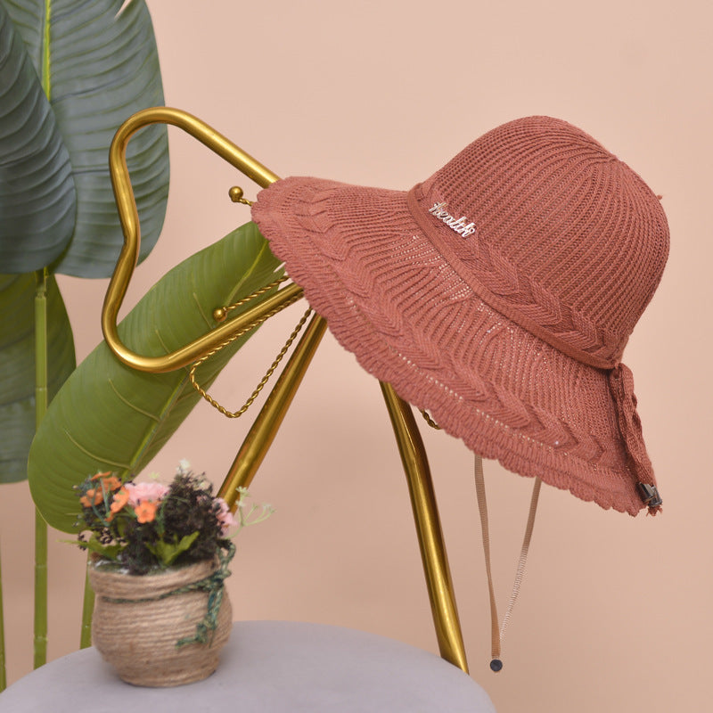 Red women's breathable summer beach hat, ensuring sun protection and comfort during travel