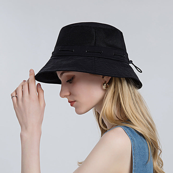 Close-up of navy blue breathable sun hat with wide brim, ideal for outdoor fashion & sun protection
