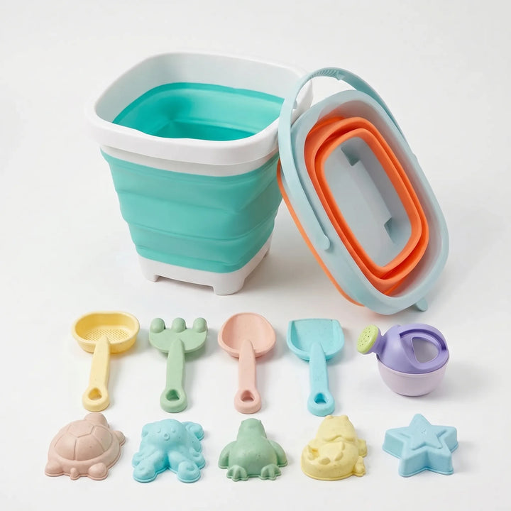Vibrant collapsible beach toy set for kids' summer fun. Includes sand bucket, shovel & molds for easy storage & travel.