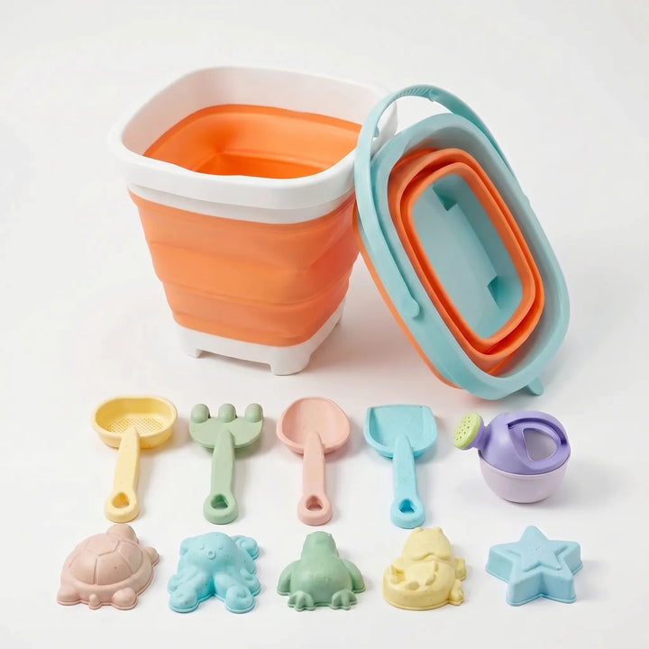 Complete collapsible beach toy set for kids: foldable bucket, shovel, rakes, & molds for creative sandcastle building.