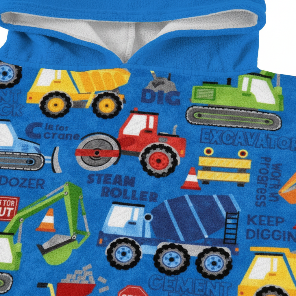 Children's apparel: Kids' hooded poncho with construction print, comfortable and water repellent for play