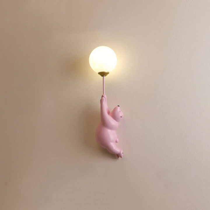 Cute animal bear LED wall lamp, creating a soft glow for a cozy nursery or kids' room.