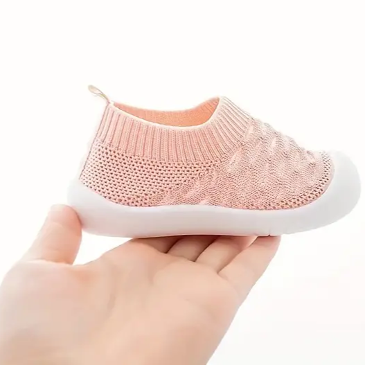 Durable FlexiFeet barefoot shoes for active kids, promoting natural foot health & comfort during playtime.