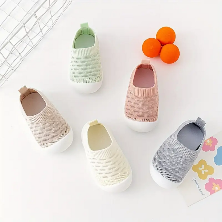 Toddler FlexiFeet barefoot shoes, ideal for first steps & early walkers, promoting natural foot growth.