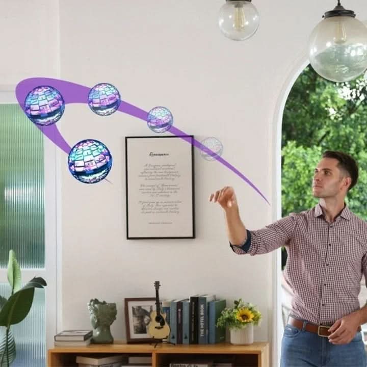 Bright LED UFO drone flying toy for kids. Hand controlled for skill development, USB rechargeable indoor/outdoor fun.